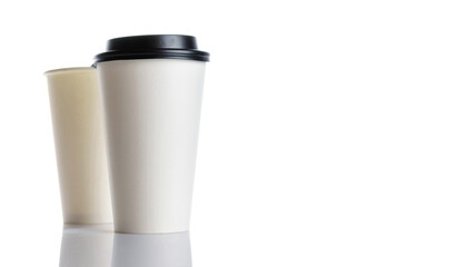 White paper cup for hot coffee with black lid isolated on white background. Takeaway blank small tea cup for your design text or banner of brand.
