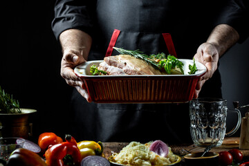 Chef hands cooking pork pork knuckle in marinade with beer for roasting, raw meat marinated seasoning spicy. banner, menu recipe place for text