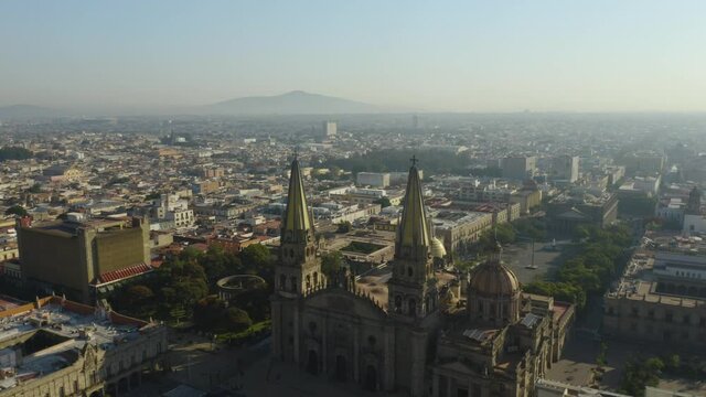 Drone Flies Between Guadalajara Cathedral Steeples on Smoggy Morning. Pollution