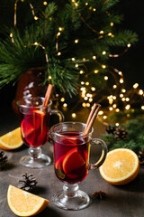 Mulled wine. Traditional christmas, new year and winter drink with red wine, citrus and spices.