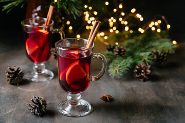 Mulled wine. Traditional christmas, new year and winter drink with red wine, citrus and spices.