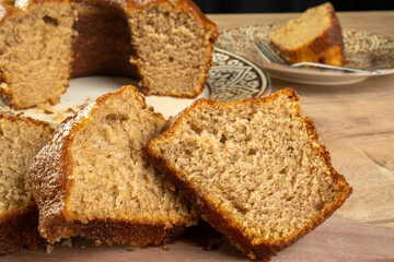 some slices of a banana cake on wooden table