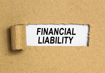 Obraz premium The text save today for tomorrow. behind torn brown paper. Business Concept image. FINANNCIAL LIABILITY