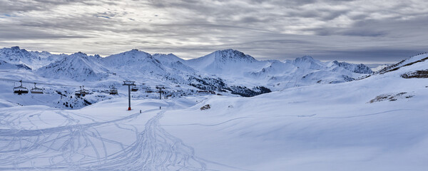 Winter mountain panoramic snowy view from the ski piste in Tignes Ski Resort.