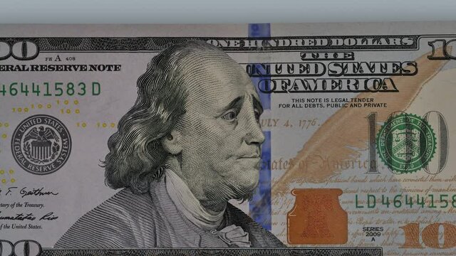 Portrait Of Dissatisfied Ben Franklin Rolling His Eyes And Expressing Disinterest.  One hundred dollar.
Animation of zoom in to close-up of US one hundred dollar bill. 
