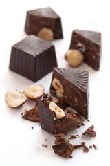 Broken chocolate candies with hazelnut inside