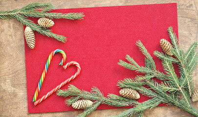 Congratulatory background for cards and congratulations. Felt background with fir branches on a...