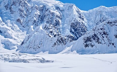 Mountain Climbers Trekking on the Kahiltna Glacier in Denali National Park