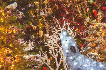 Christmas warm installations and decorations with garlands, trees, pine needles and illumination. 05 December 2020, Minsk, Belarus
