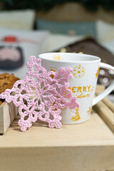 Cup of tea with oatmeal cookieson the lace napkin