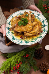 New Year dinner table with roasted turkey, chicken and other dishes.