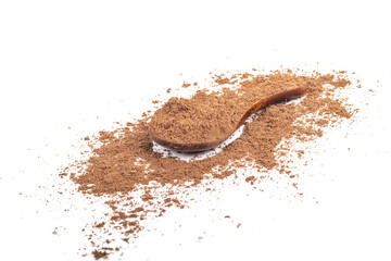 Studio lighting. allspice on a wooden spoon, on a white background. There is a shadow. Close-up. No...