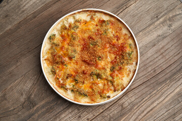 Frittata - Italian dish with baked broccoli, scrambled eggs