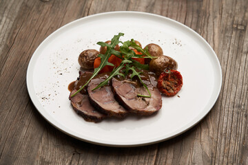 Baked pork and potatoes. Pork meat and vegetables