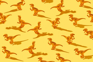 Dinosaur toys pattern with shadows.