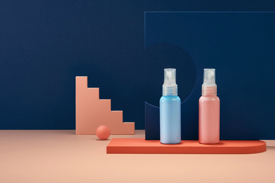 Bottles mock up on pastel colored background.