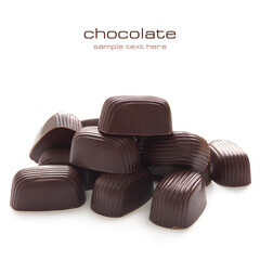 Chocolate candy with sweet cream inside on the white background