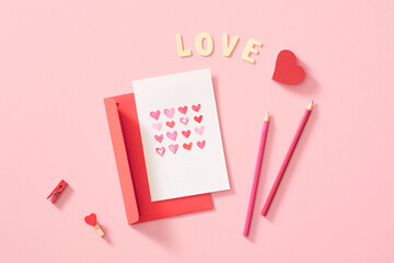 Watercolour heart on a pink background, envelope with a greeting card. Valentine day concept