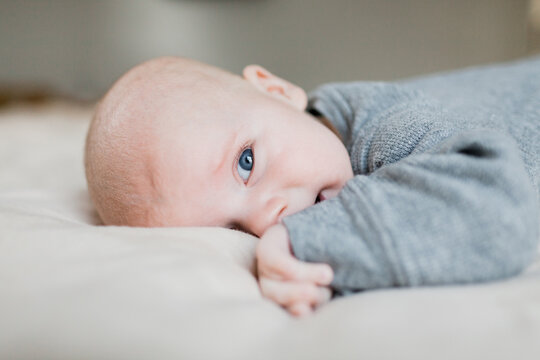 Three month old baby boy with blue eyes