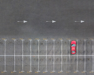 Panoramic view from drone above empty parking spaces.