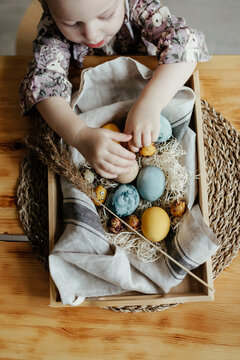 Beautiful little girl with Easter eggs