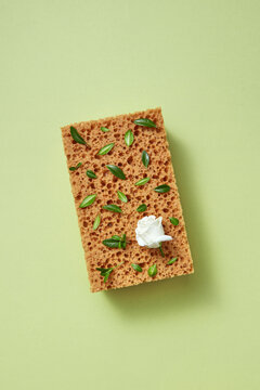 Cleaning sponge with leaves and rose.
