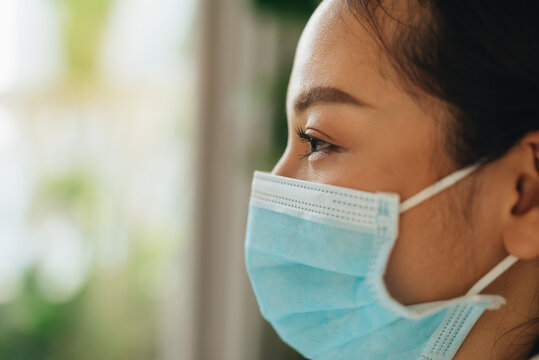 Close-up of an asian woman has the flu. Dangerous infectious disease.