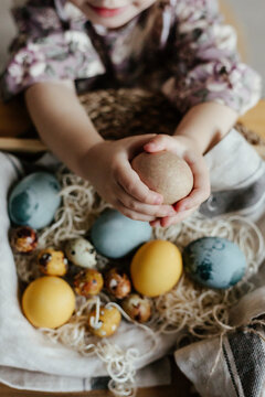 Beautiful little girl with Easter eggs
