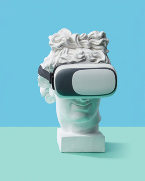 Antique statue head wearing in 3D glasses.