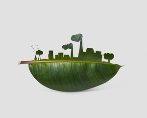 Silhouette of industrial city on a leaf.