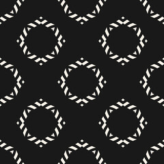 Vector ornamental seamless pattern. Elegant black and white geometric ornament texture with flower silhouettes, diamonds. Abstract monochrome floral background. Repeat design for decor, print, cover
