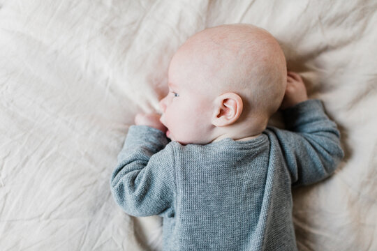 Three month old baby boy with blue eyes