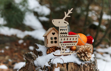 Naklejka premium Cristmas festive background with a mock-up of a deer pulling a sleigh with gifts.New year concept.