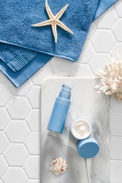 Beautiful spa composition on white mosaic floor tile