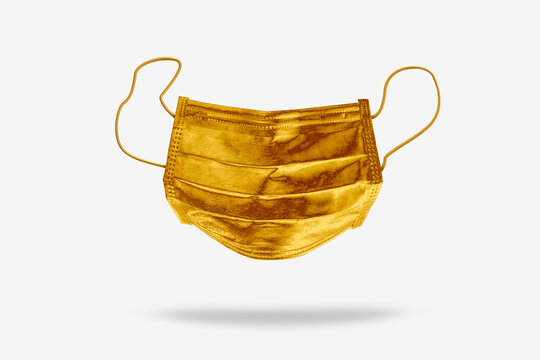 Protective mask painted golden.