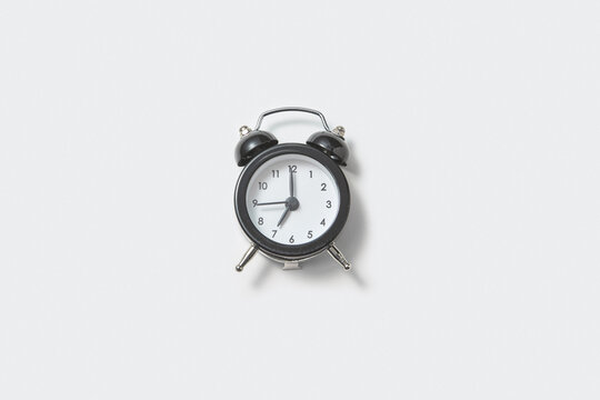 Retro alarmclock is showing seven.