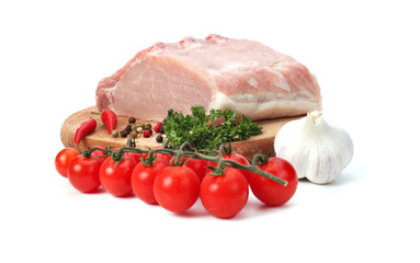 Pork meat with vegetables on white background.