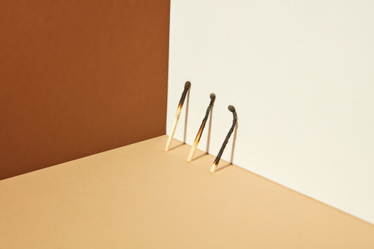 Isometric view with burnt matches and shadows.