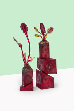 Cut raw beetroot cubes as a pyramids.