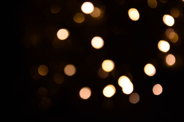 Lights blurred bokeh abstract on dark background, rozmyte światełka na ciemnym tle lampki świąteczne - obrazy, fototapety, plakaty