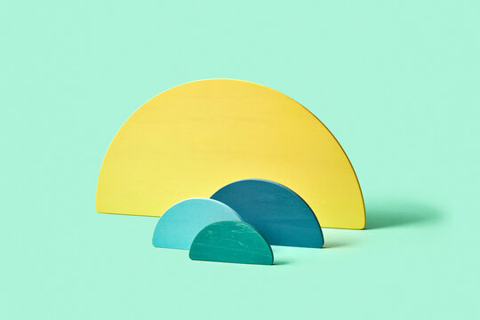 Wooden colorful different size hemispheres.