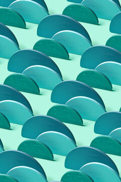 Vertical pattern from wooden colored hemispheres.