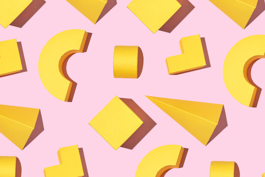 Abstract yellow three-dimensional figures.