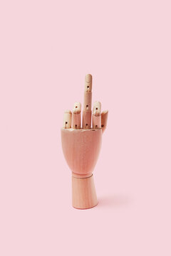 Gesture middle finger of wooden hand.
