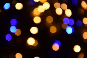 Lights blurred bokeh abstract on dark background, rozmyte światełka na ciemnym tle lampki świąteczne - obrazy, fototapety, plakaty