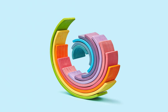 Balanced colorful wooden spiral construction.