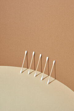 Geomertic shadows from ears sticks on a curved surface.