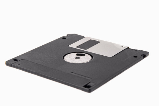 The back of a black floppy disk isolated on a white background