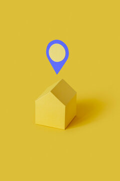 Papercraft yellow house with location symbol.