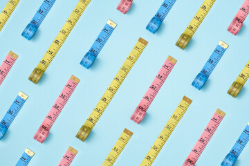 Colorful measure tapes pattern.
